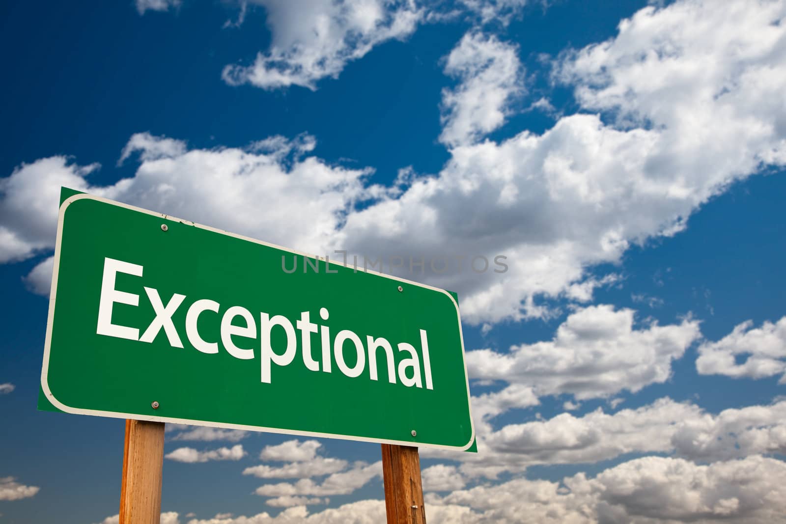Exceptional Green Road Sign with Dramatic Clouds and Sky - The Kudos Sign Series.