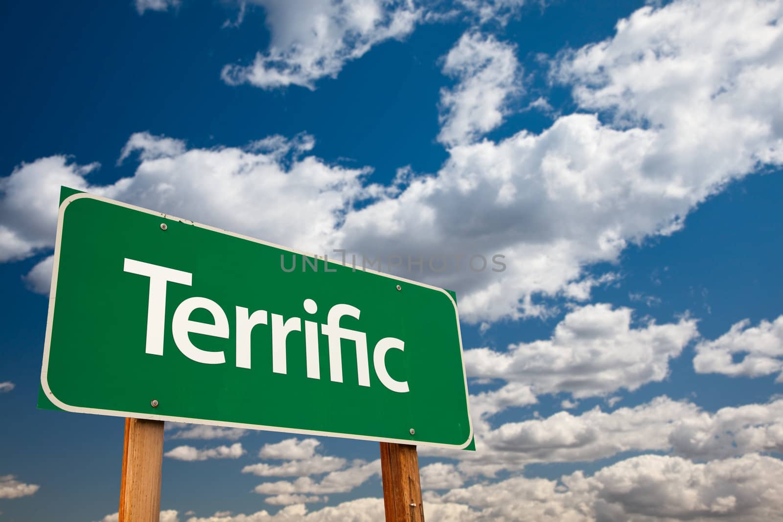 Terrific Green Road Sign with Dramatic Clouds and Sky - The Kudos Sign Series.