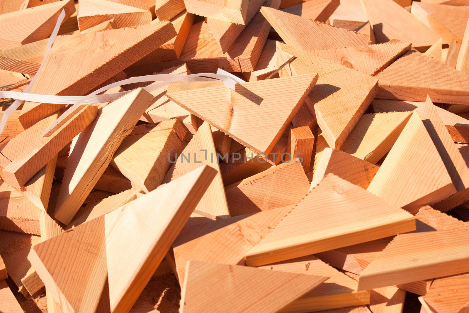 Pile of Building Lumber Scraps at Construction Site.