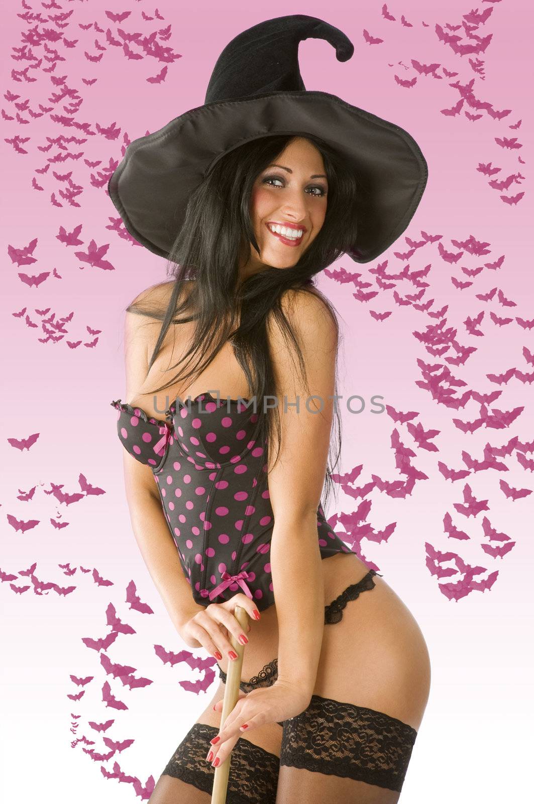 sexy witch in underwear with hat and black stocking smiling