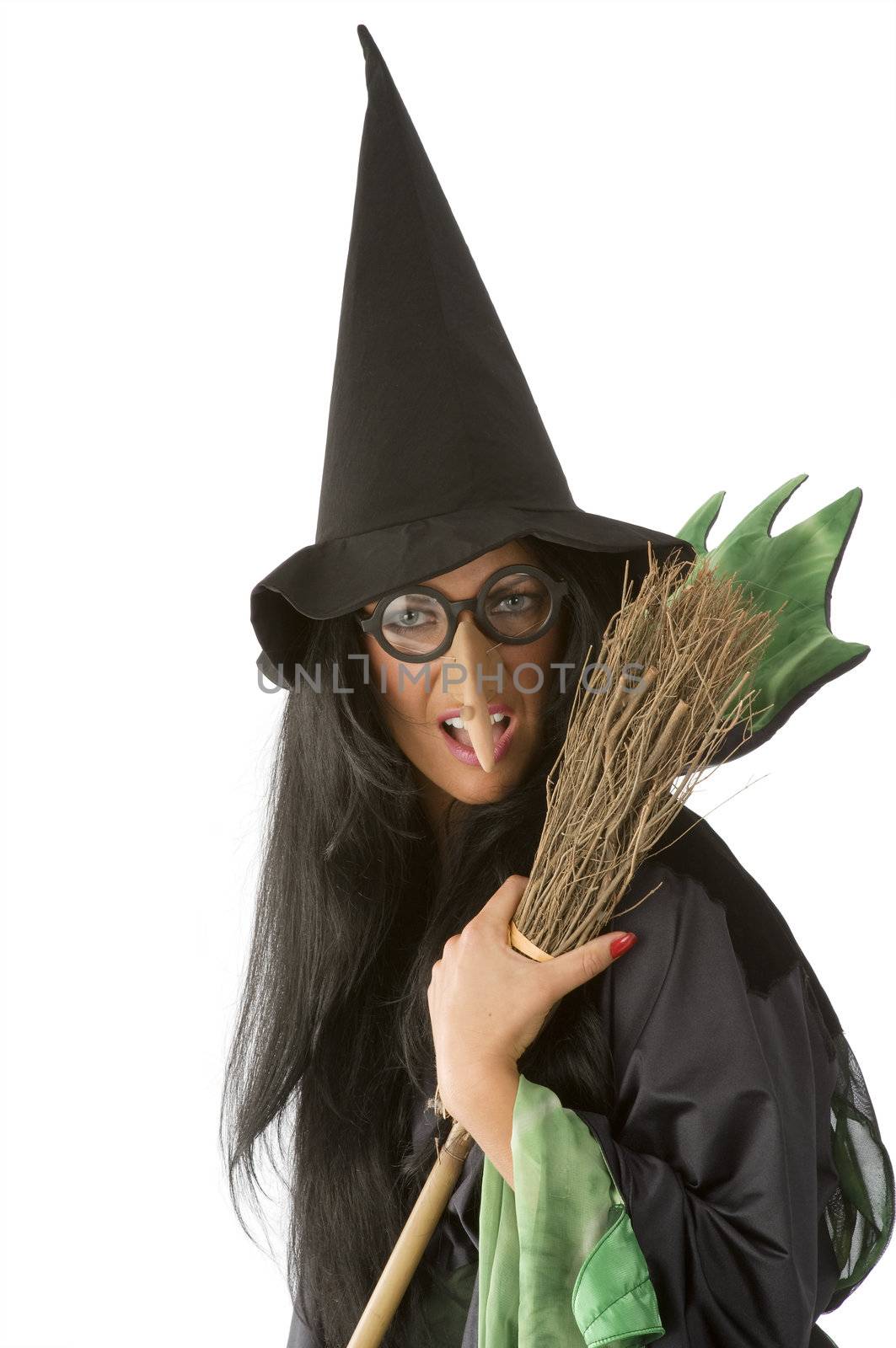 big nose and glasses as an old ugly witch keeping a broom