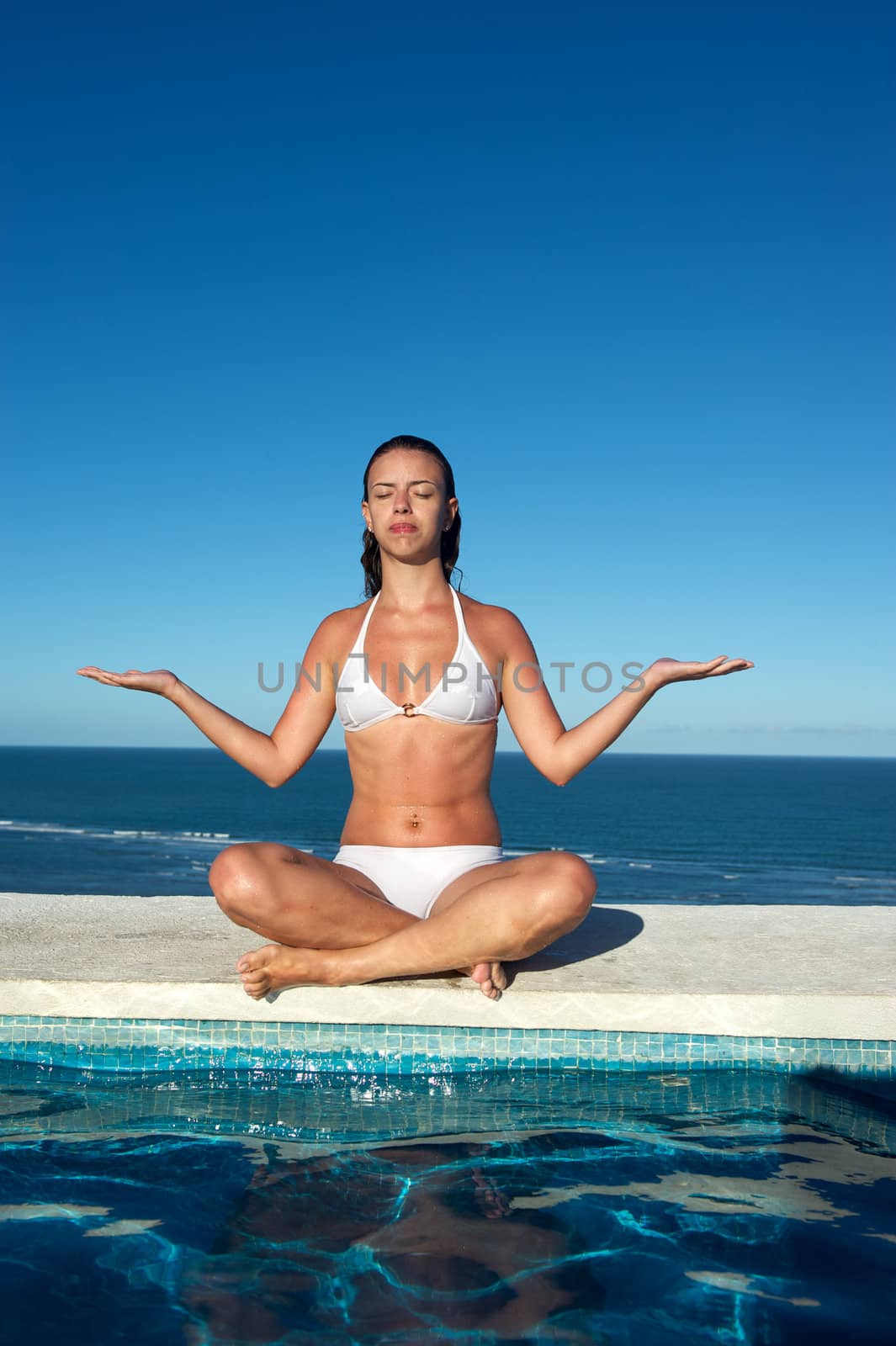 Woman relaxing in the spa swimming pool in Arraial d'Ajuda, Brazil