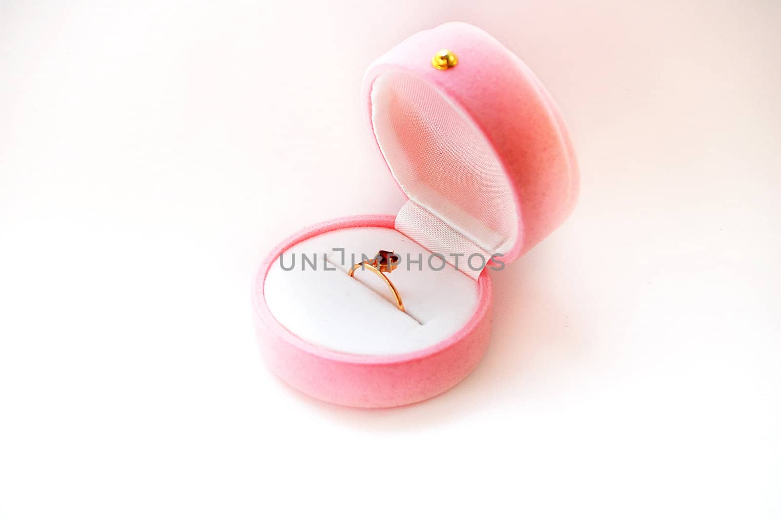 The Golden Ring with a ruby in a box