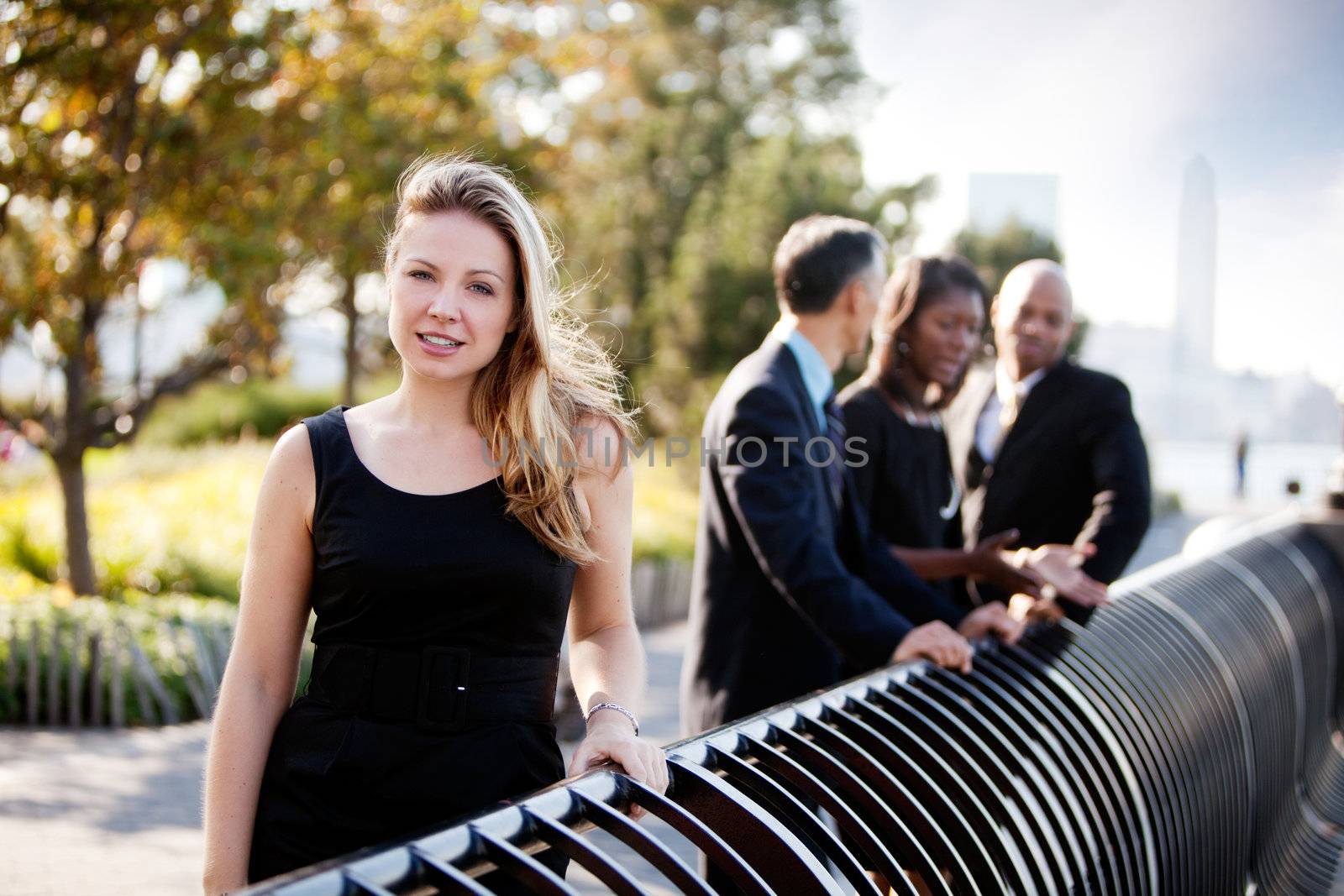 A beautiful caucasian business woman in an outdoor setting