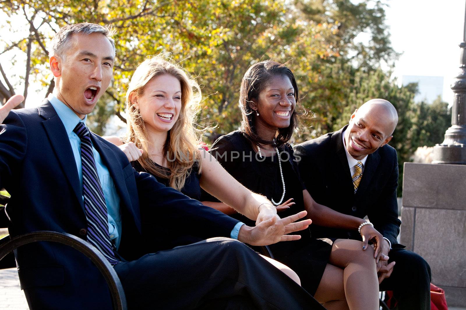 A group of business people having fun and joking