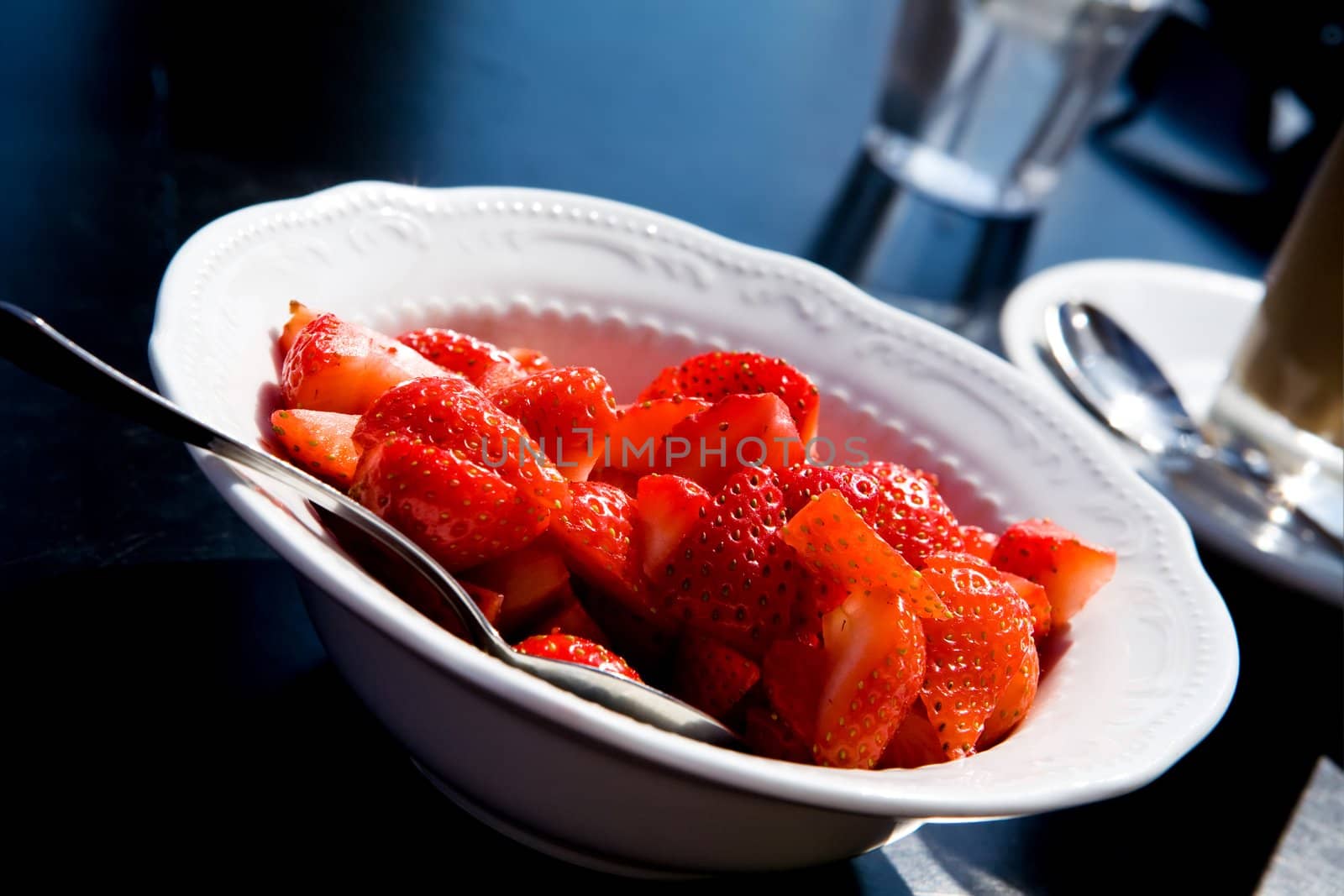 Fresh strawberry salad and drinks outdoors