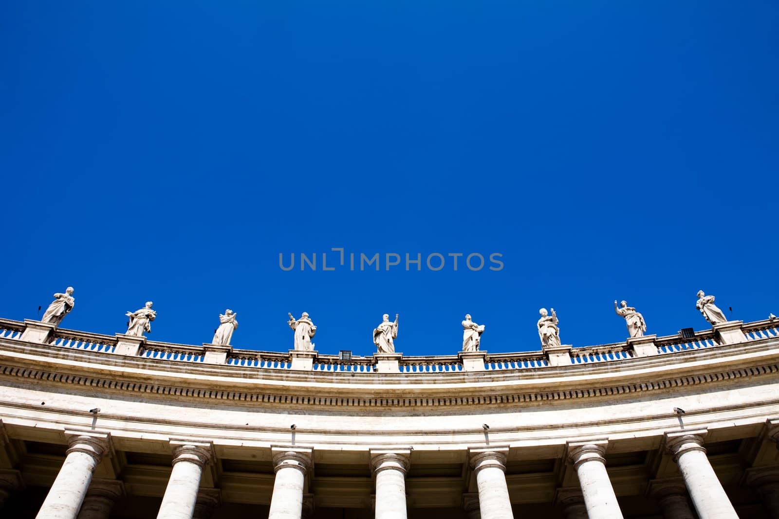 Famous colonnade of St. Peter's Basilica in Vatican, Rome, Italy