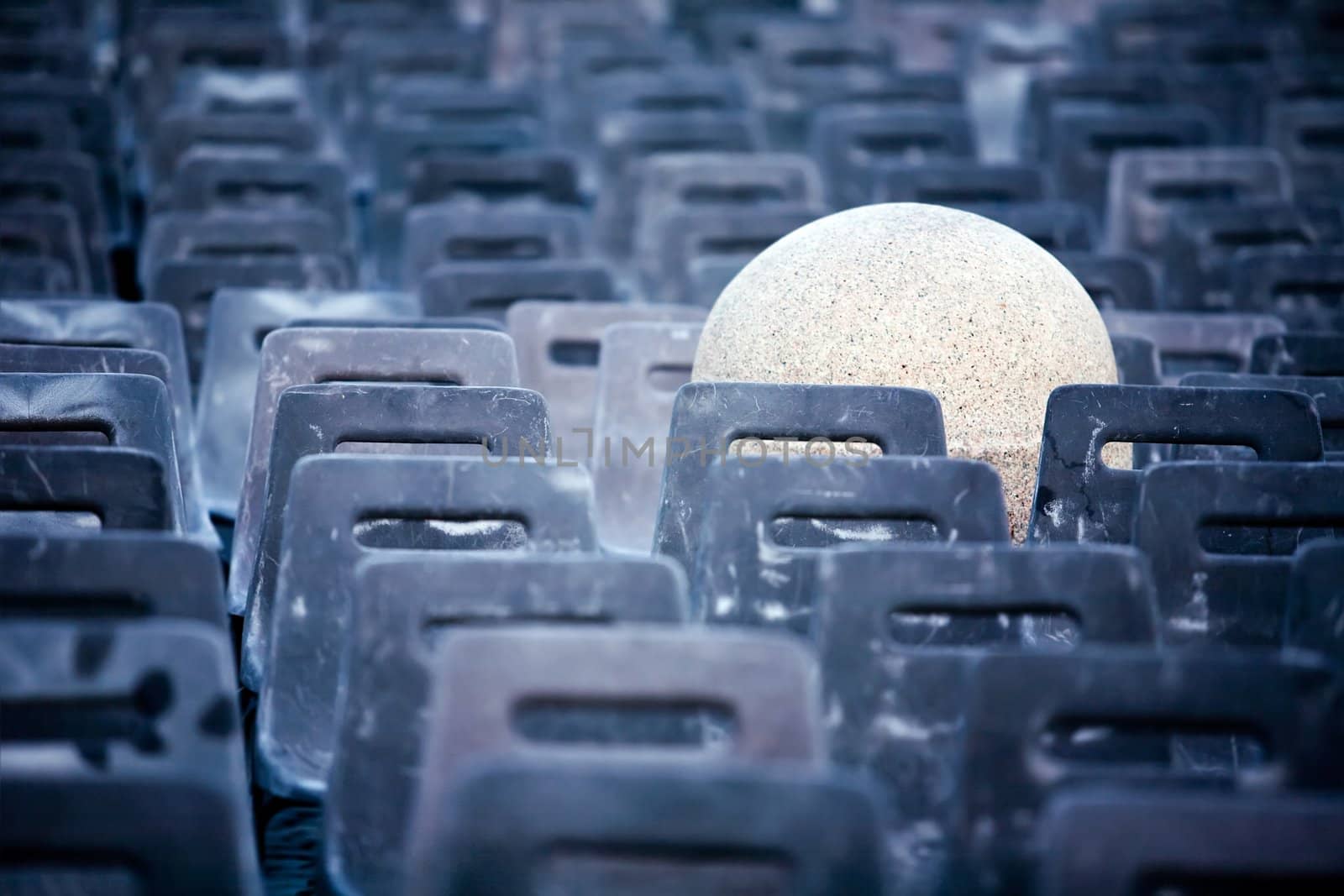 Concept pictures of empty chairs and stone post in the Vatican