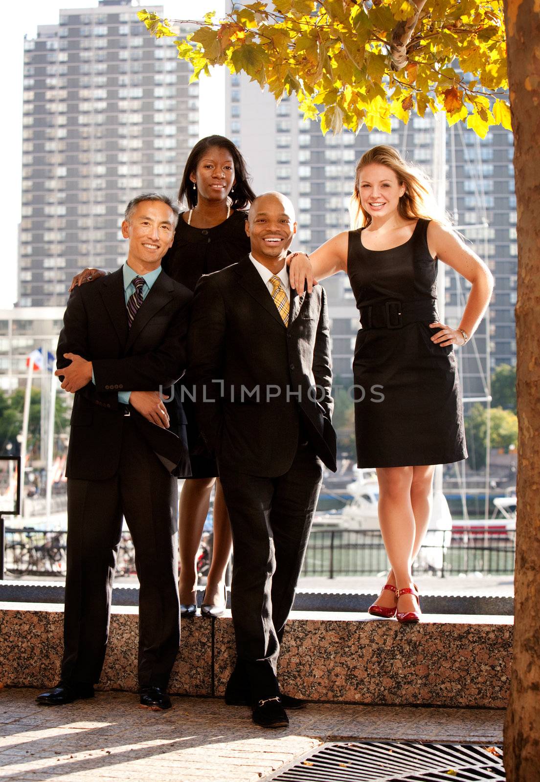 A business team portrait in an outdoor setting