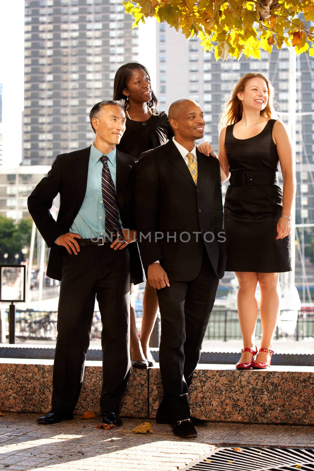 A business team looking to the side or into the distance