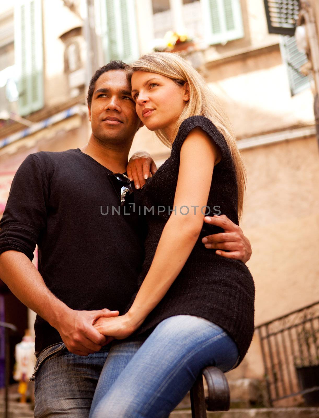 A couple in a quaint european street, France