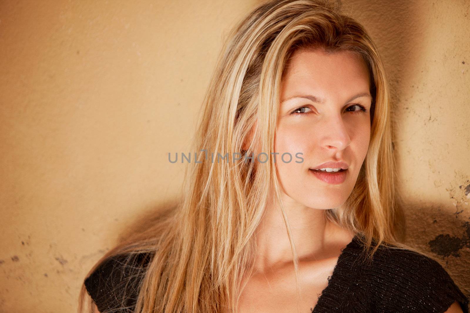 A casual street portrait of a happy attractive european woman