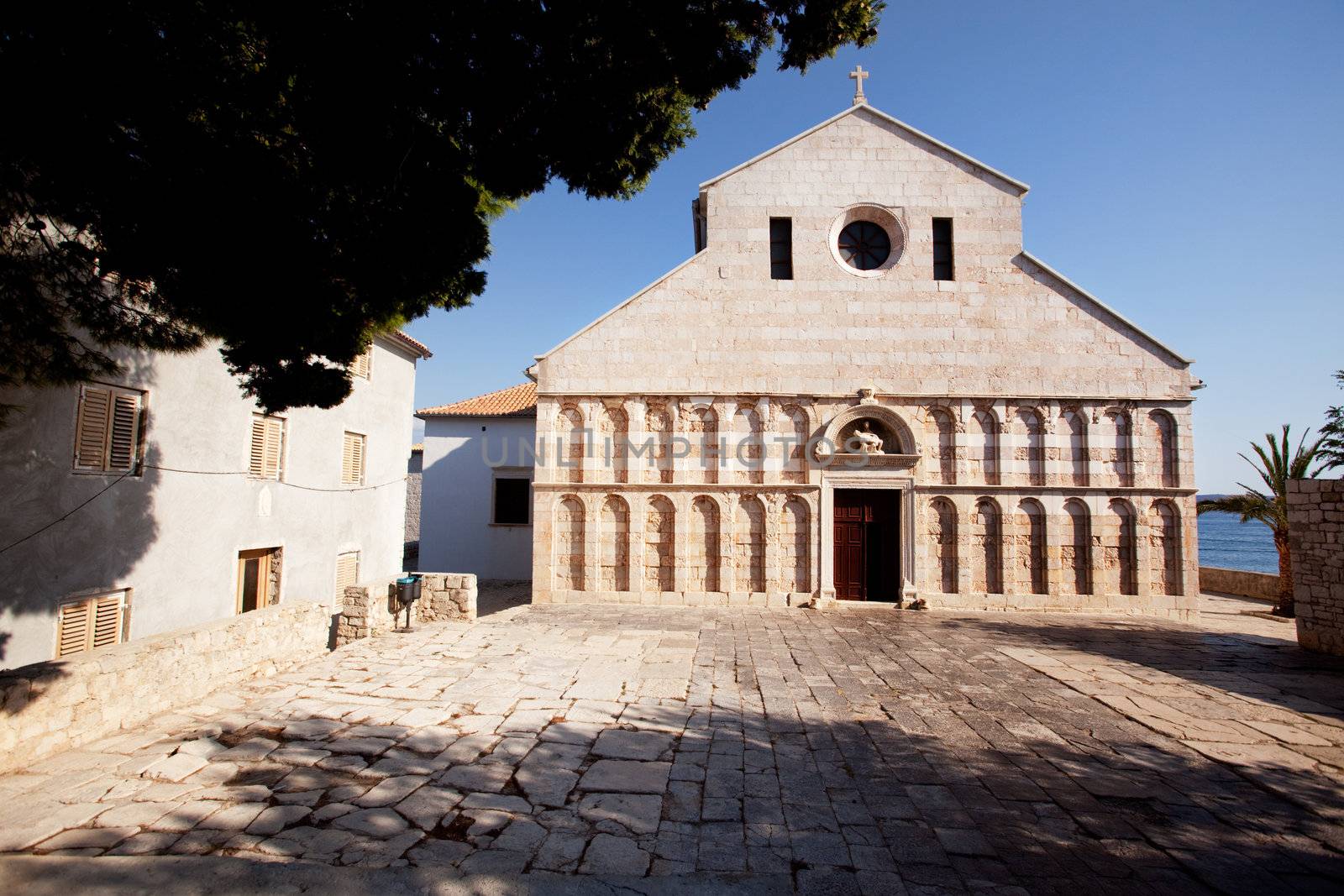 An old stone cathedral on the Island of Rab, Croatia - The Cathedral of the Holy Virgin Mary's Assumption