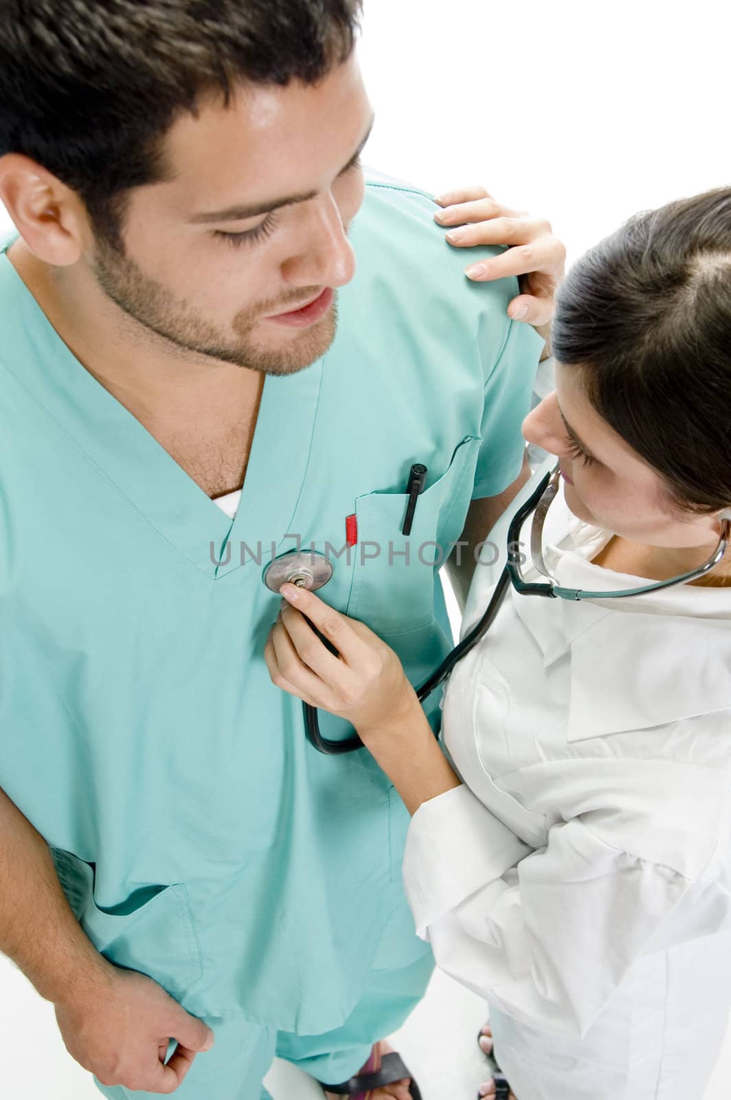 nurse examining the patient with stethoscope by imagerymajestic