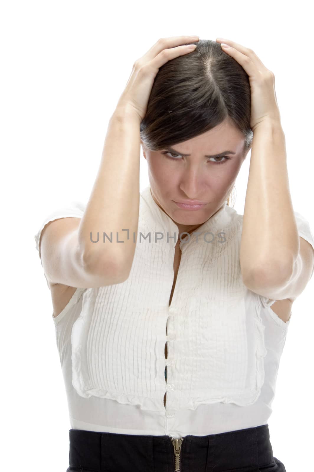 young woman in tension against white background