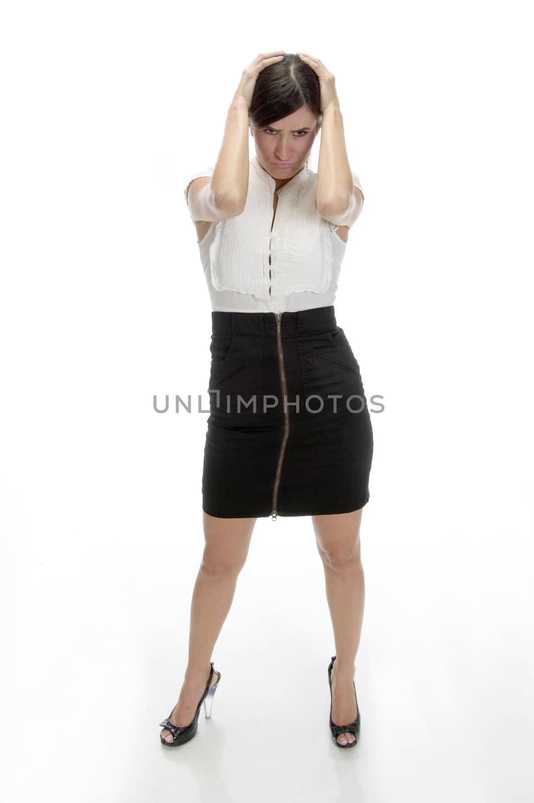 young woman in frustration on an isolated background