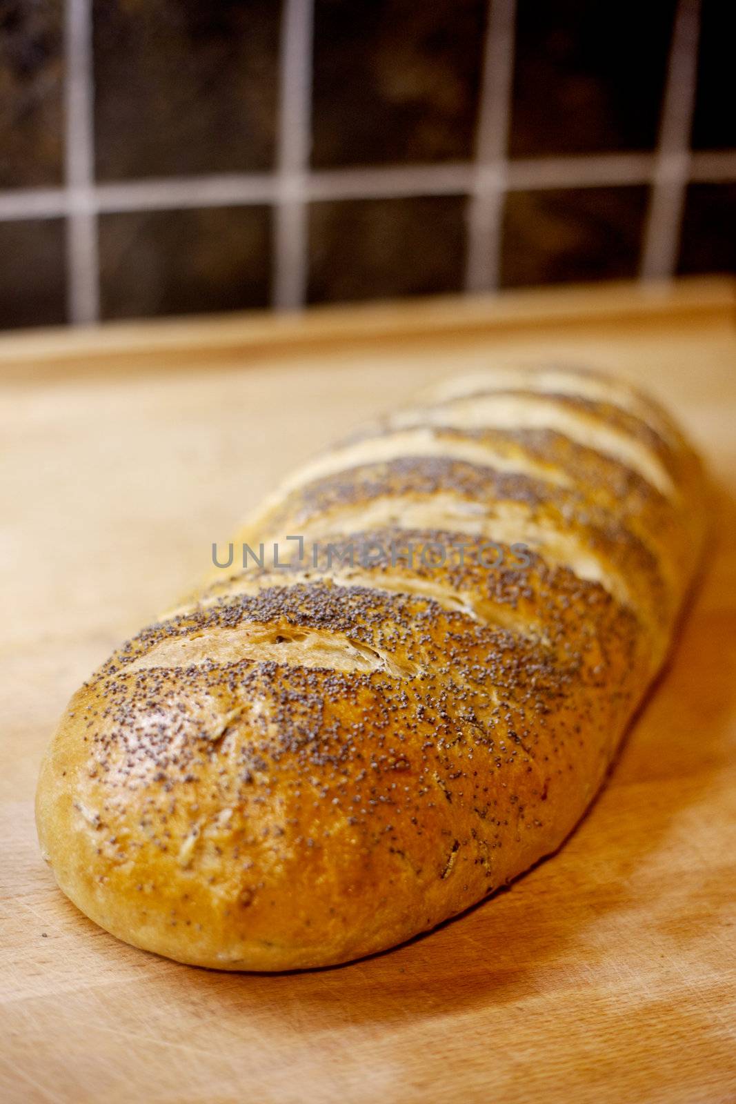 A loaf of whole wheat home made bread - shallow depth of field