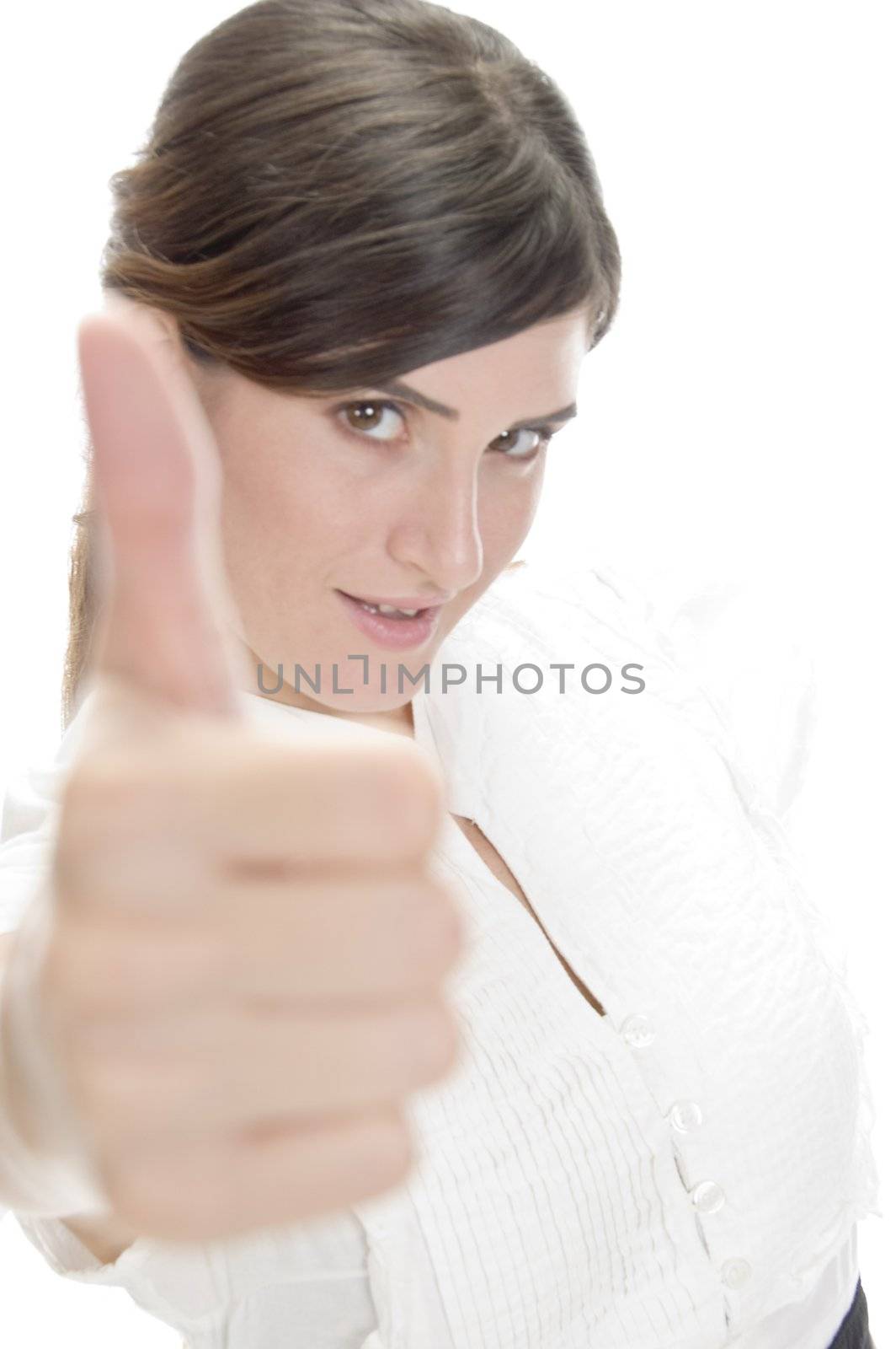 smiling lady showing approval sign against white background