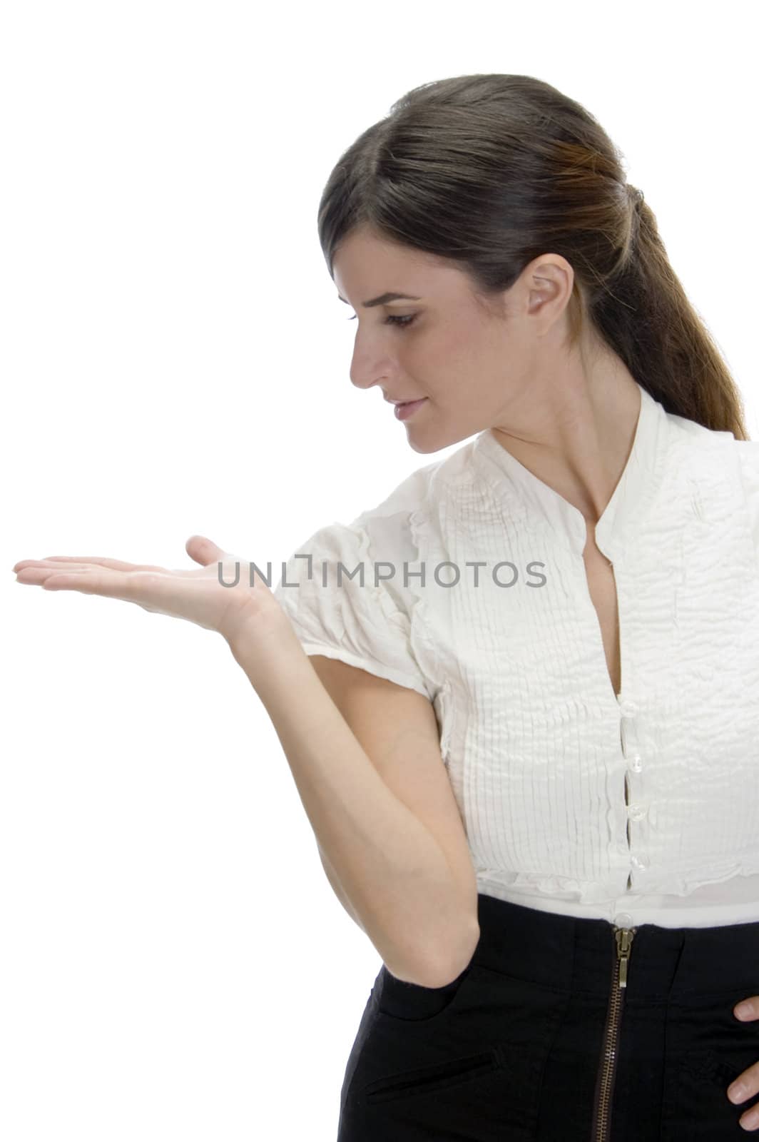 young lady looking her palm on an isolated white background