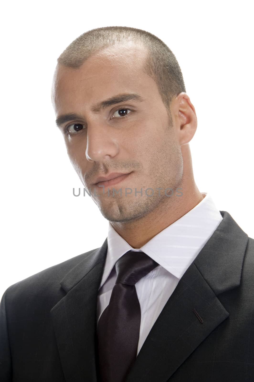close up pose of young businessman looking at camera