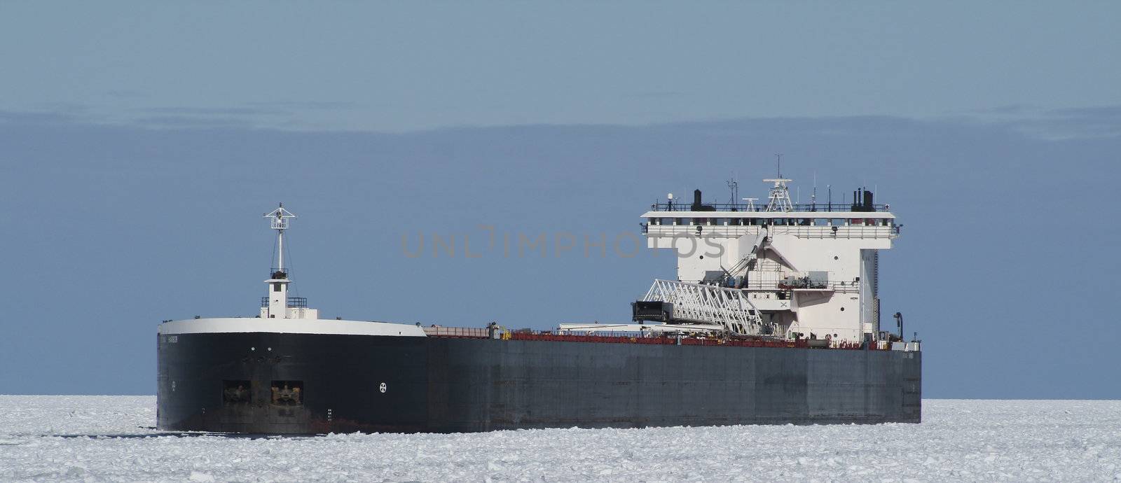 A Great Lakes Freighter underway in the ice