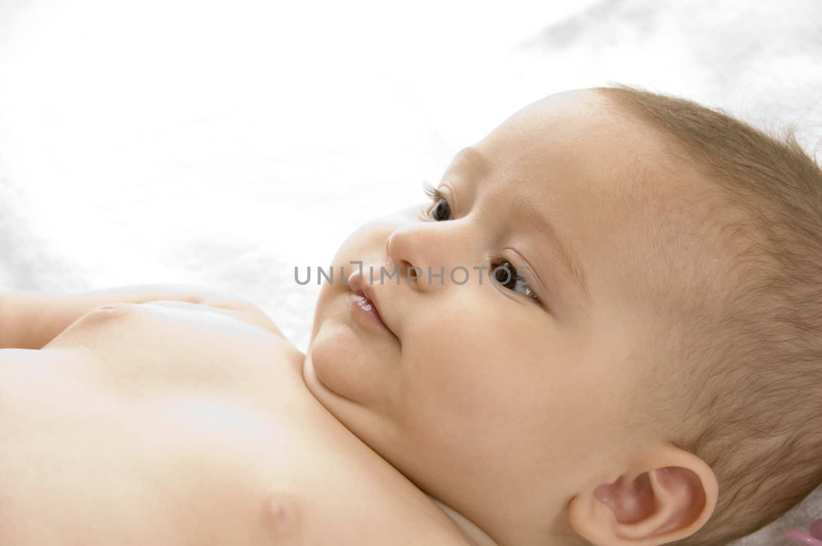 young baby posing on an isolated white background