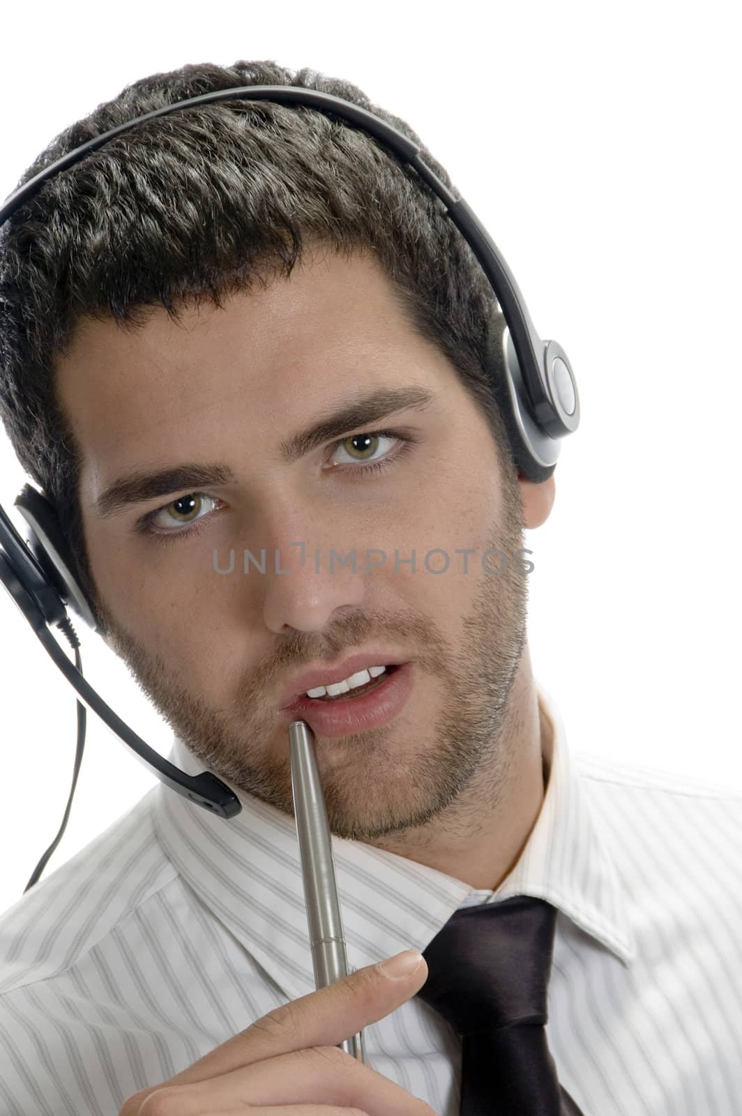 businessman posing with pen against white background