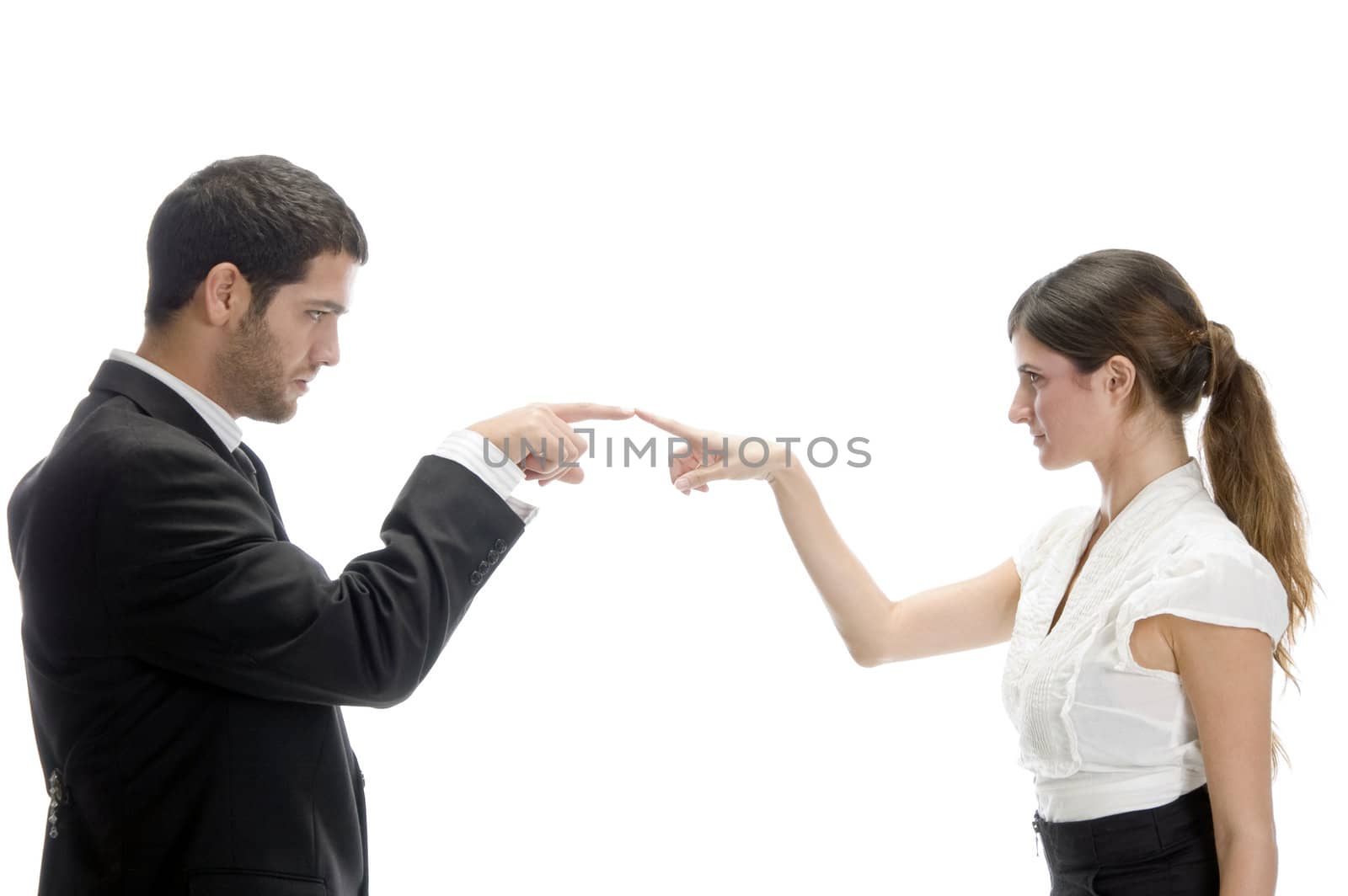 attractive couple joining fingers on an isolated white background