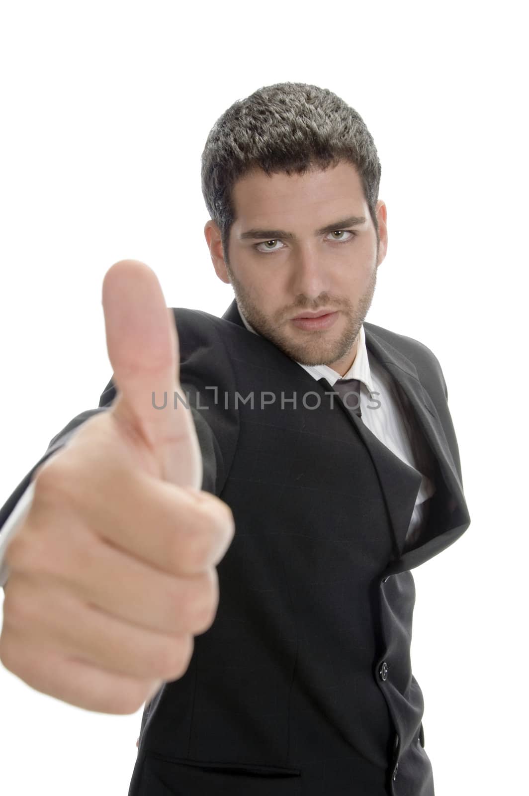 young successful businessman showing thumbs up