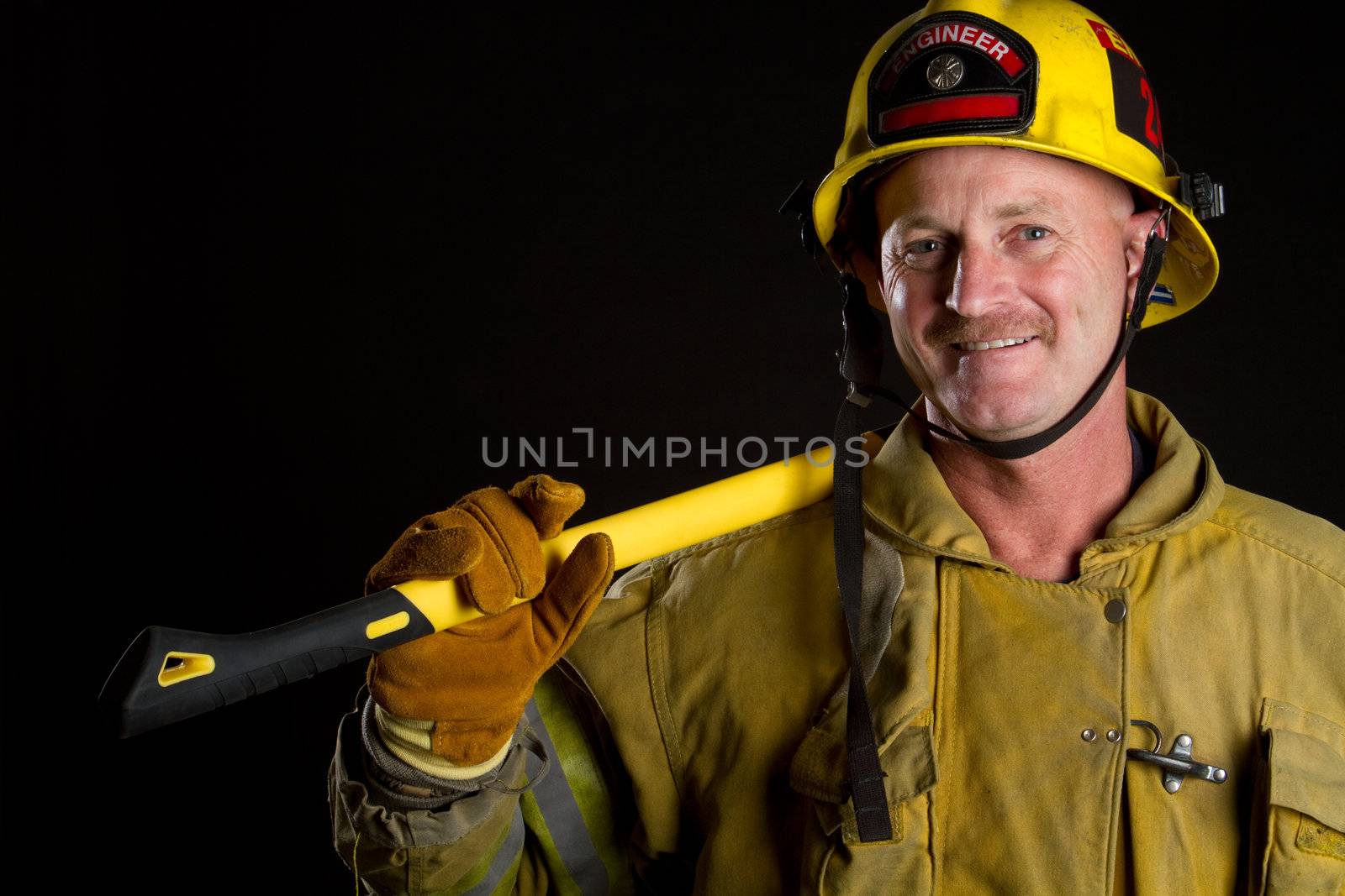 Firefighter holding axe