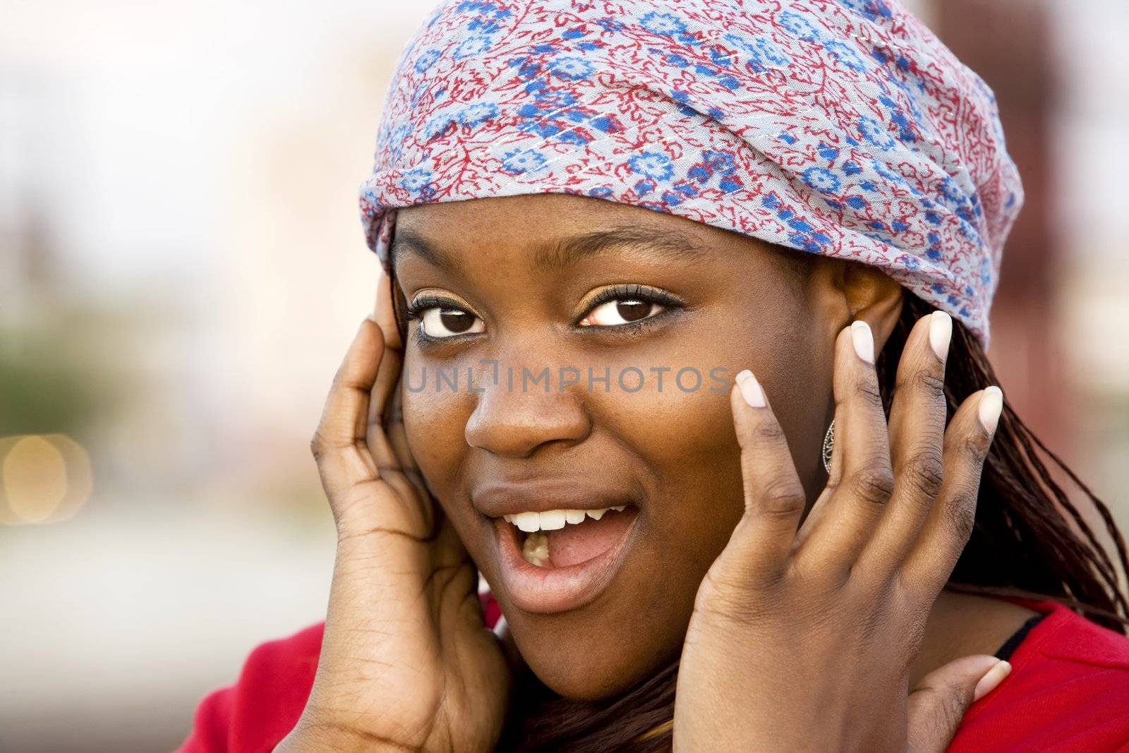 Closeup of a pretty African American woman with a scarf