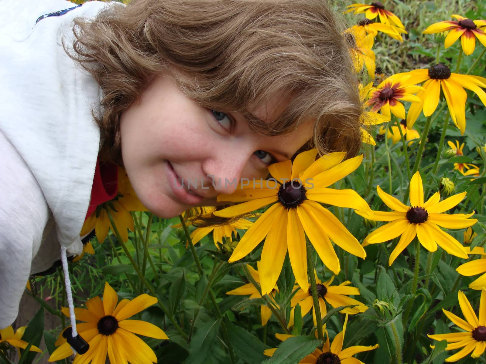 Flowers and the girl , clear day,  grass       