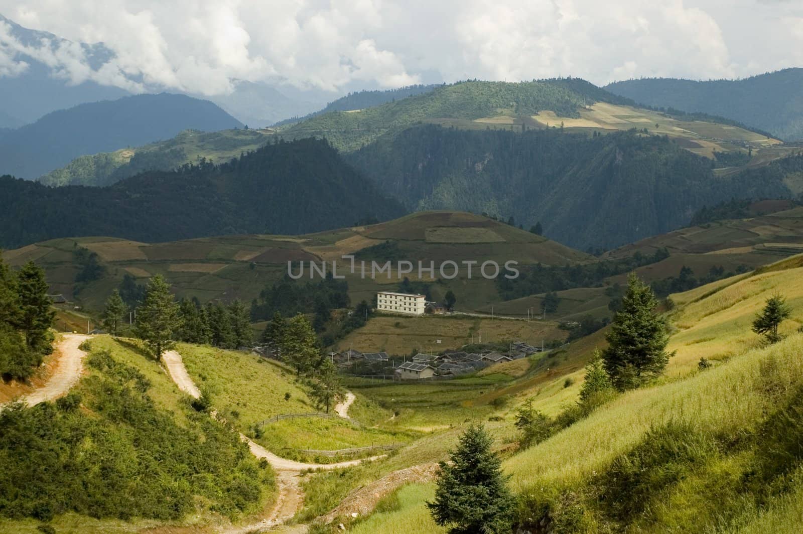 Yunnan province, China. General landscape with high mountains, hills, trees around Shangrila town.