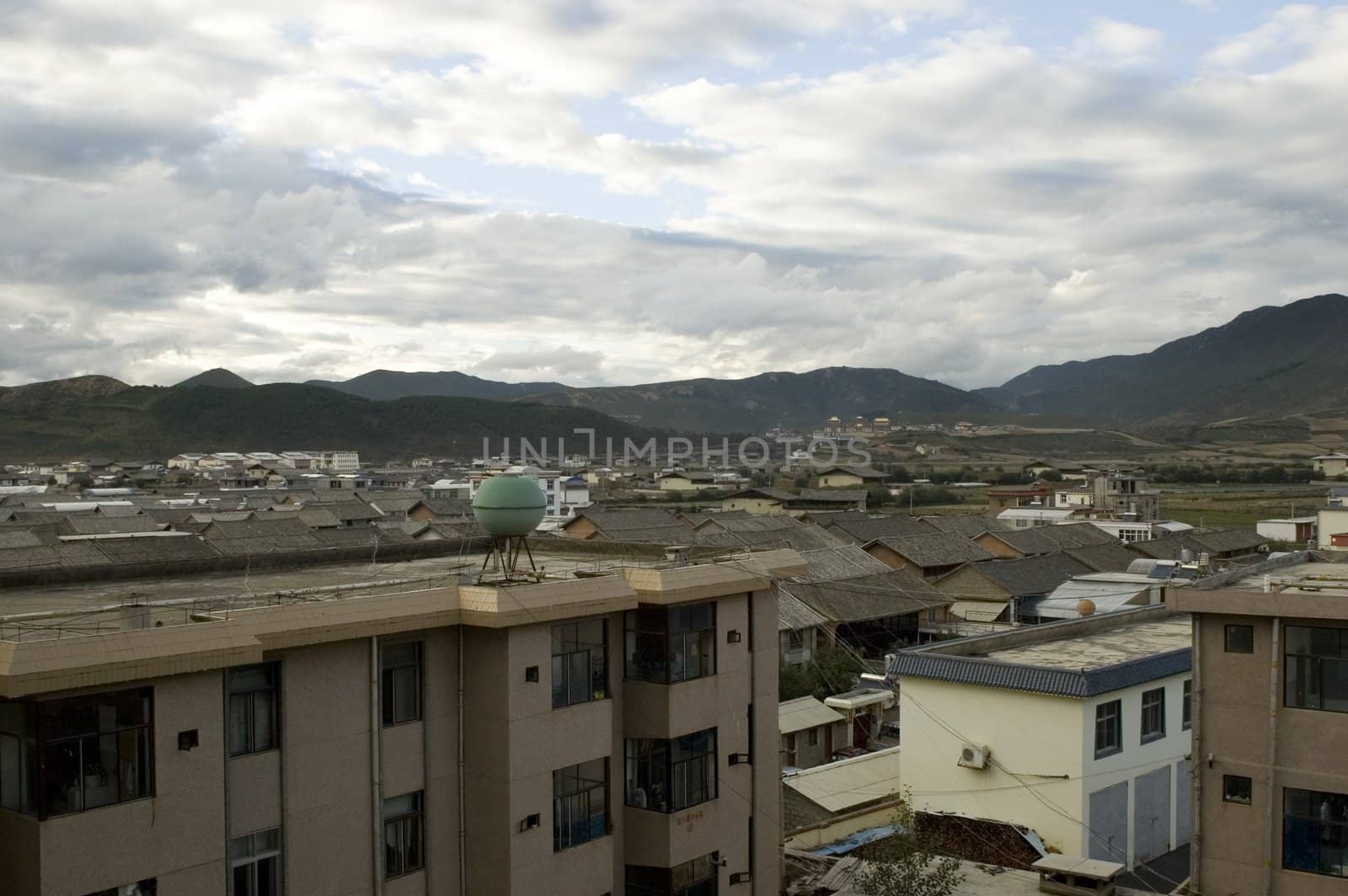 Famous and mysterious town Shangrila in Yunnan province, China surrounded by Sino-Tibetan mountains.