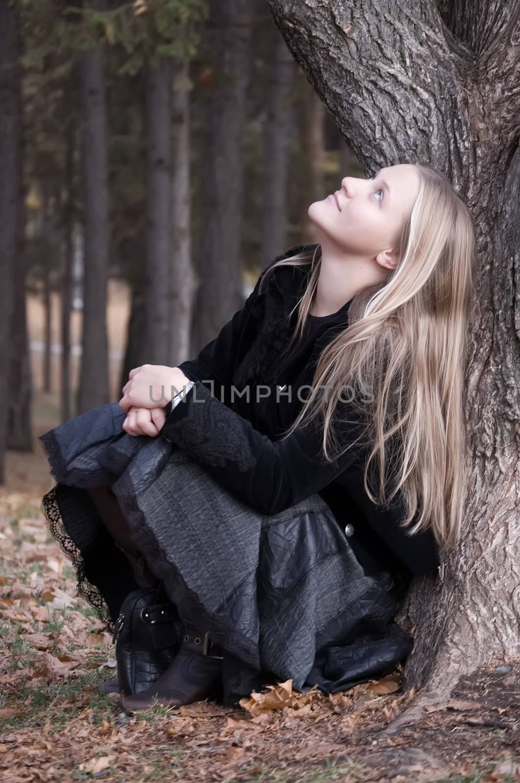 The girl at a tree by Pospelova