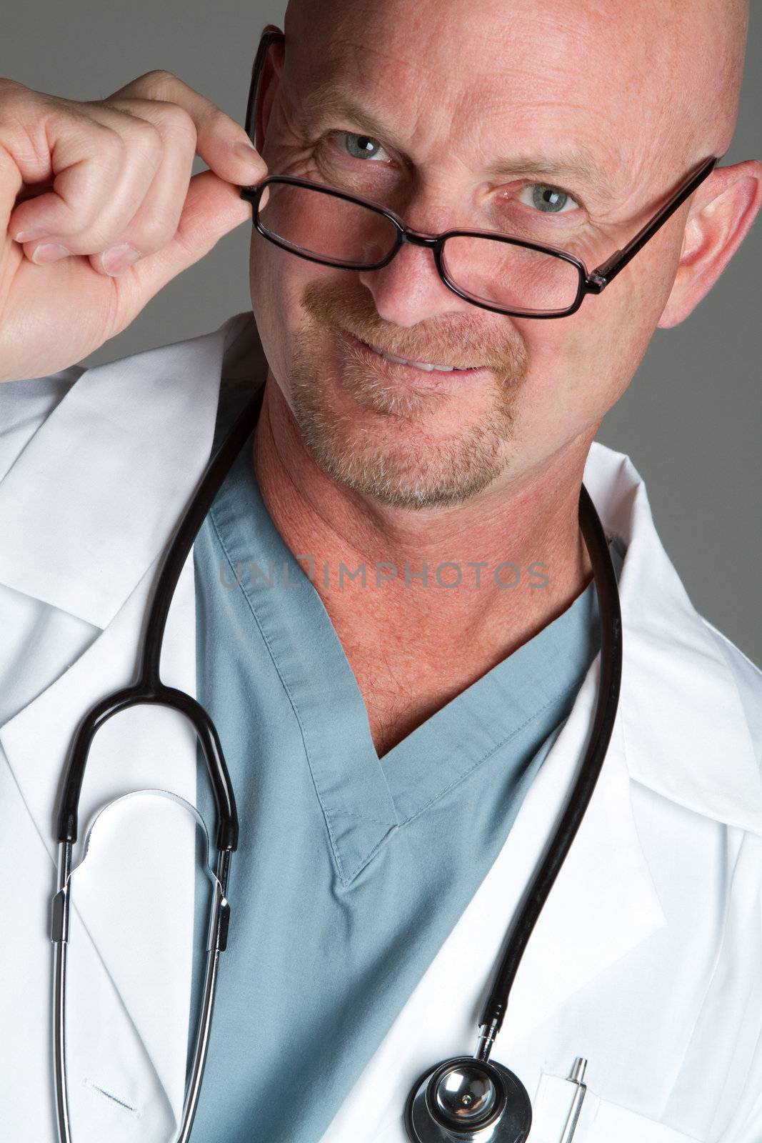 Smiling doctor wearing glasses