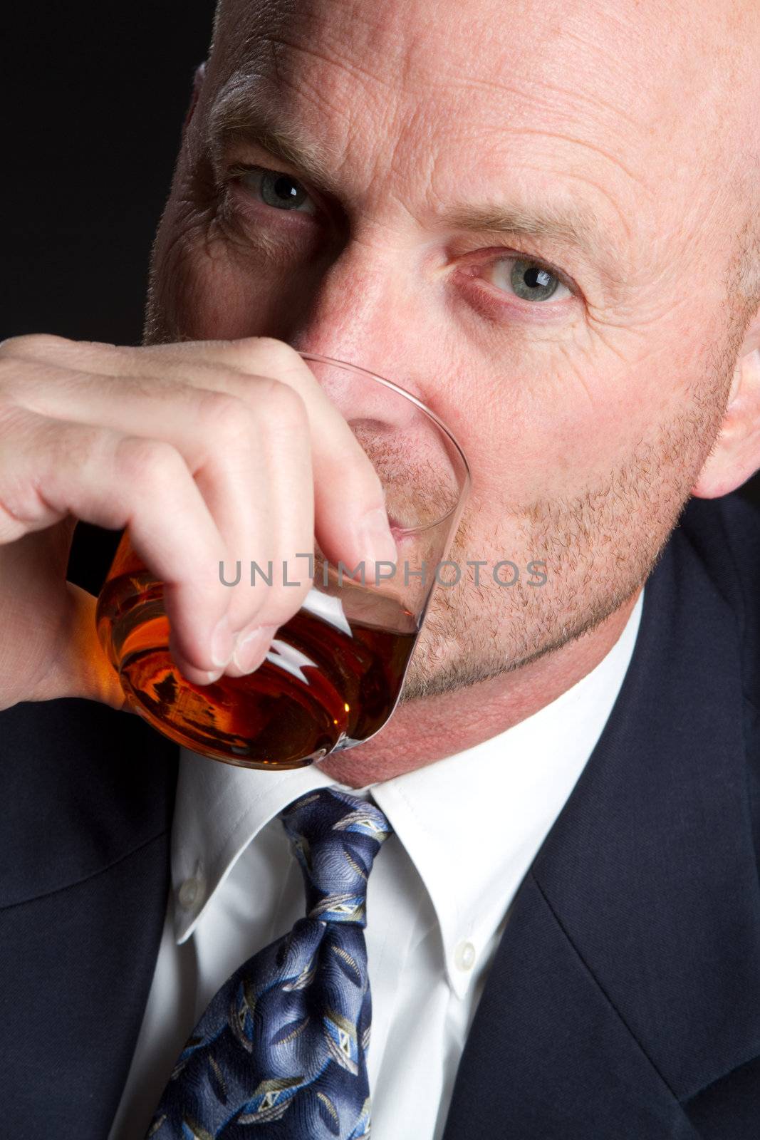 Man drinking whiskey alcohol