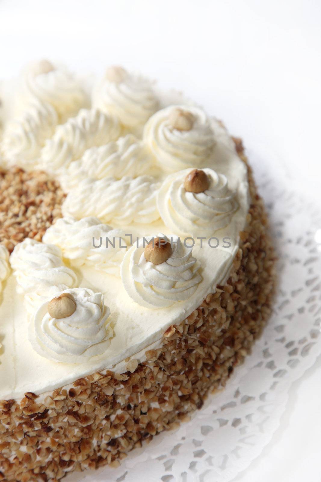 Cream cake with almond edge - close-up