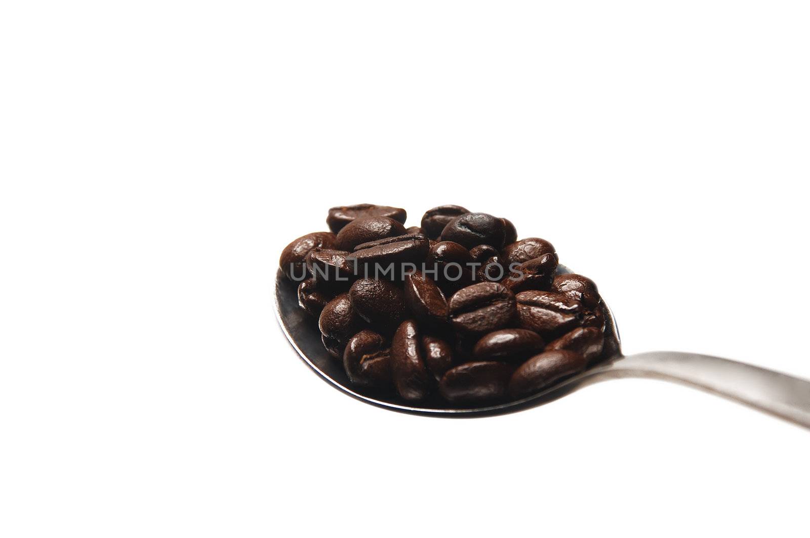 coffee beans on spoon by keko64