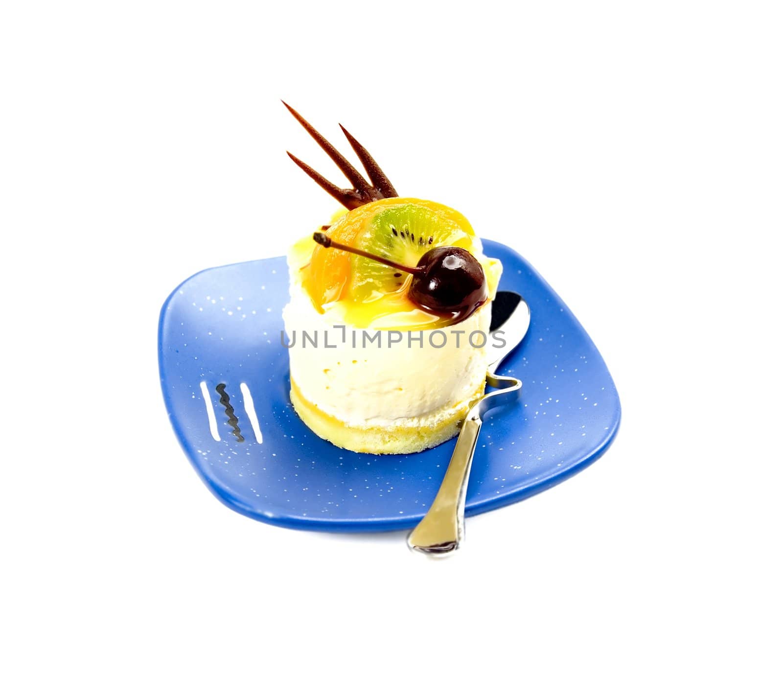 piece of fresh fruit cake on white background