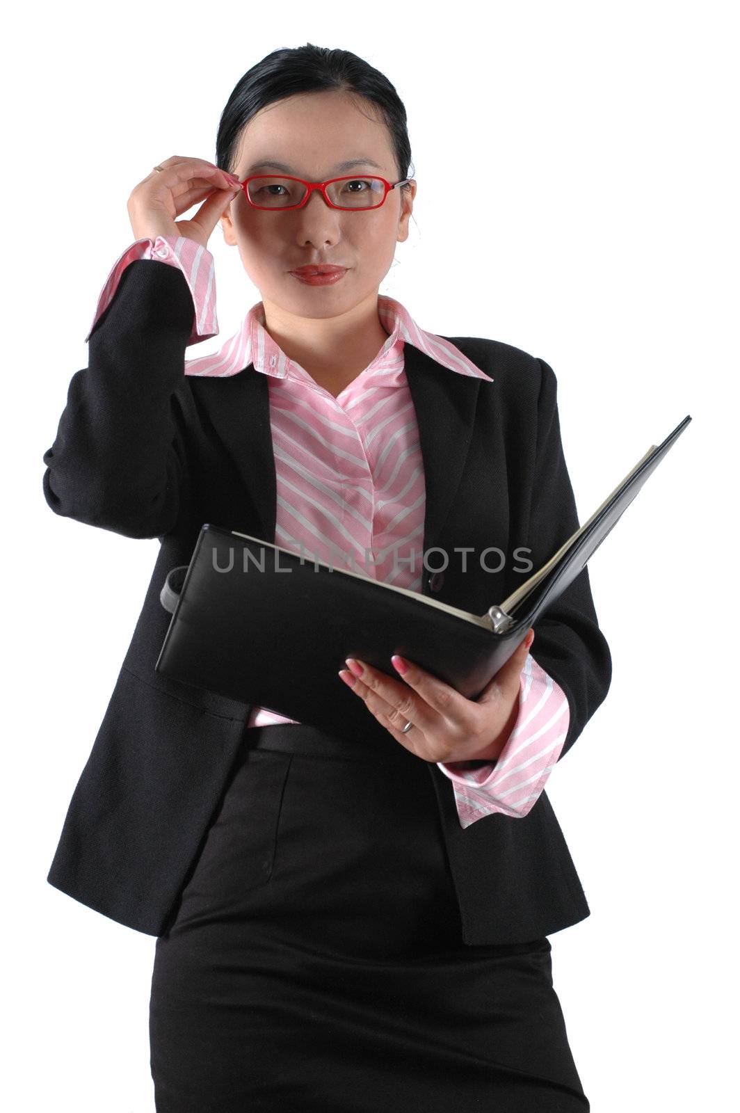 Chinese businesswoman, wearing lady's suit and shirt.  Holding documents.