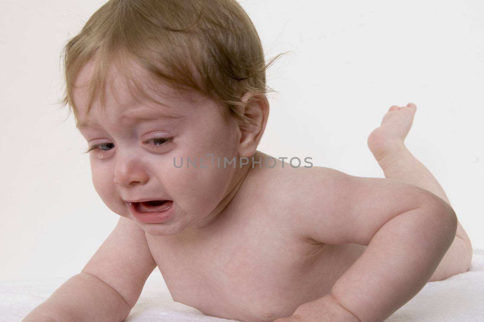 crying small child on an isolated background