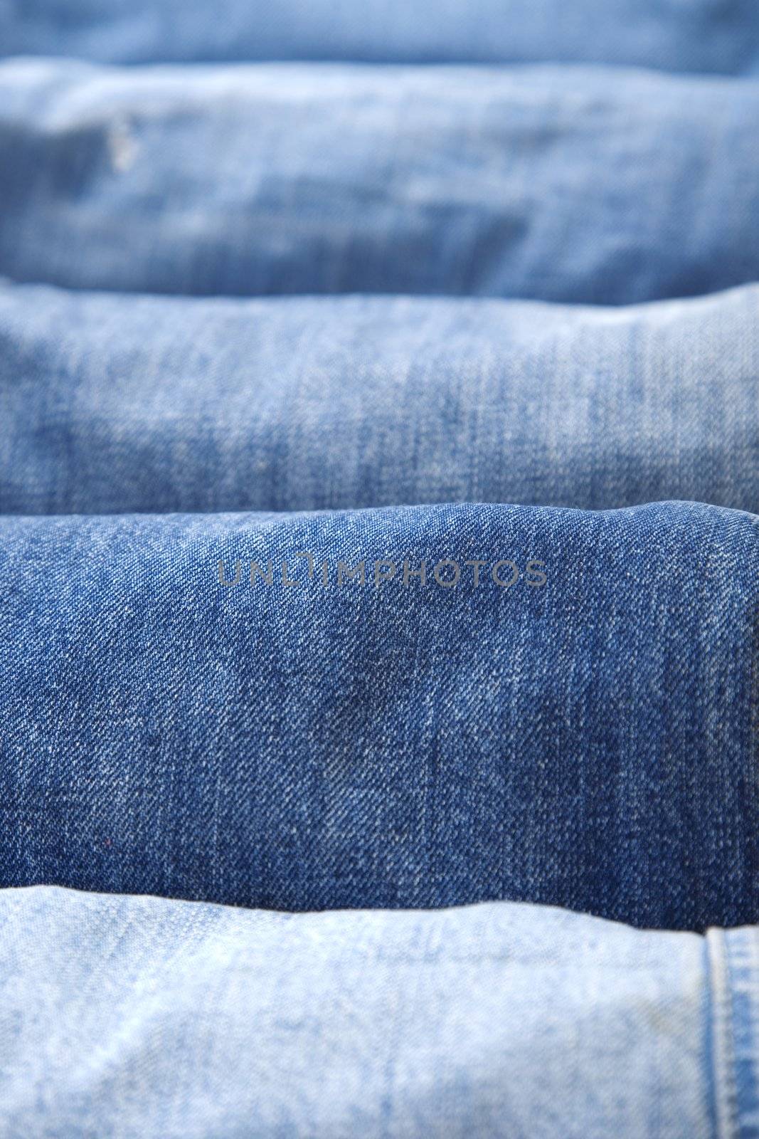 stack details of blue jeans, different textures and colors