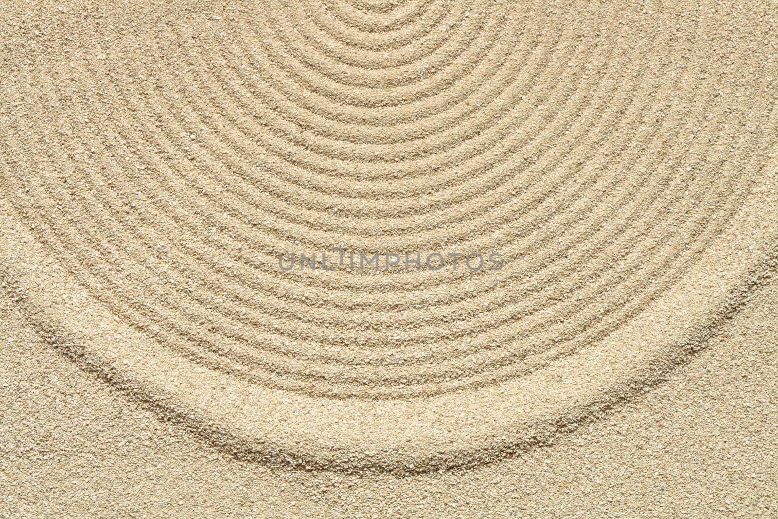 Abstract yellow sand background with drawing rings