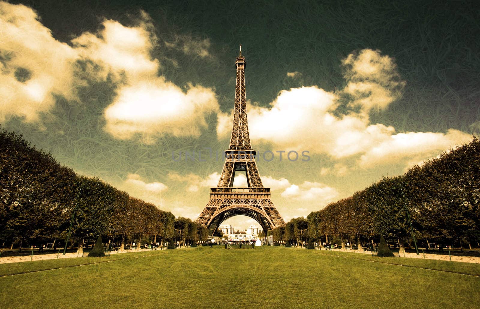 Grunge sepia photo of the Eiffel tower in Paris with washed out textures and wide angle central perspective.