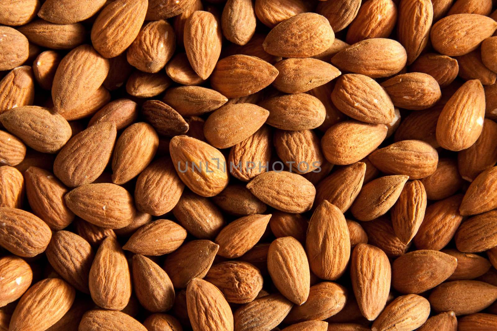 Close up on raw dried almonds - top view
