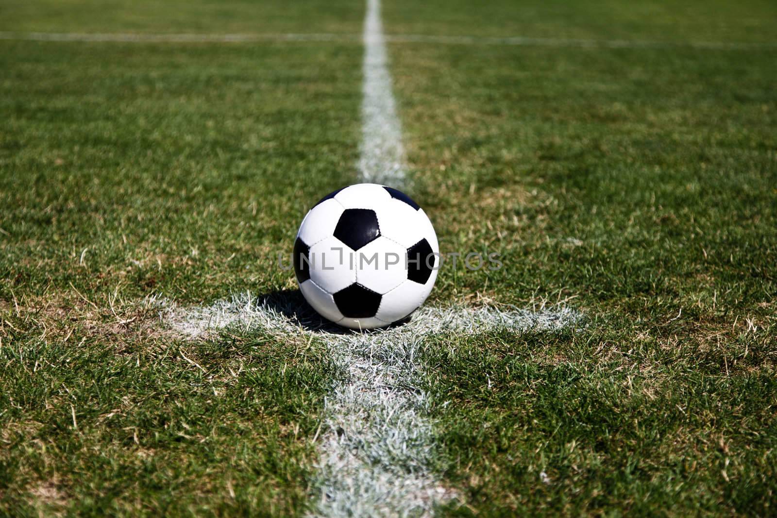 Photo Of A Soccer Ball On The Centre Point Of The Stadium