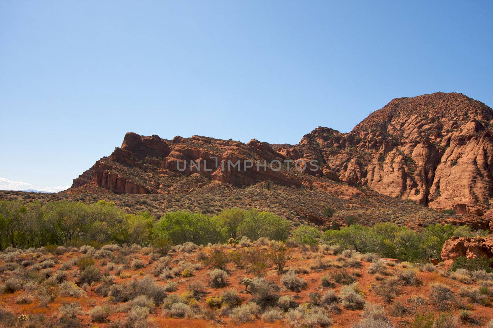 Red Rocks of Utah with Dramatic Blue Sky and Clouds