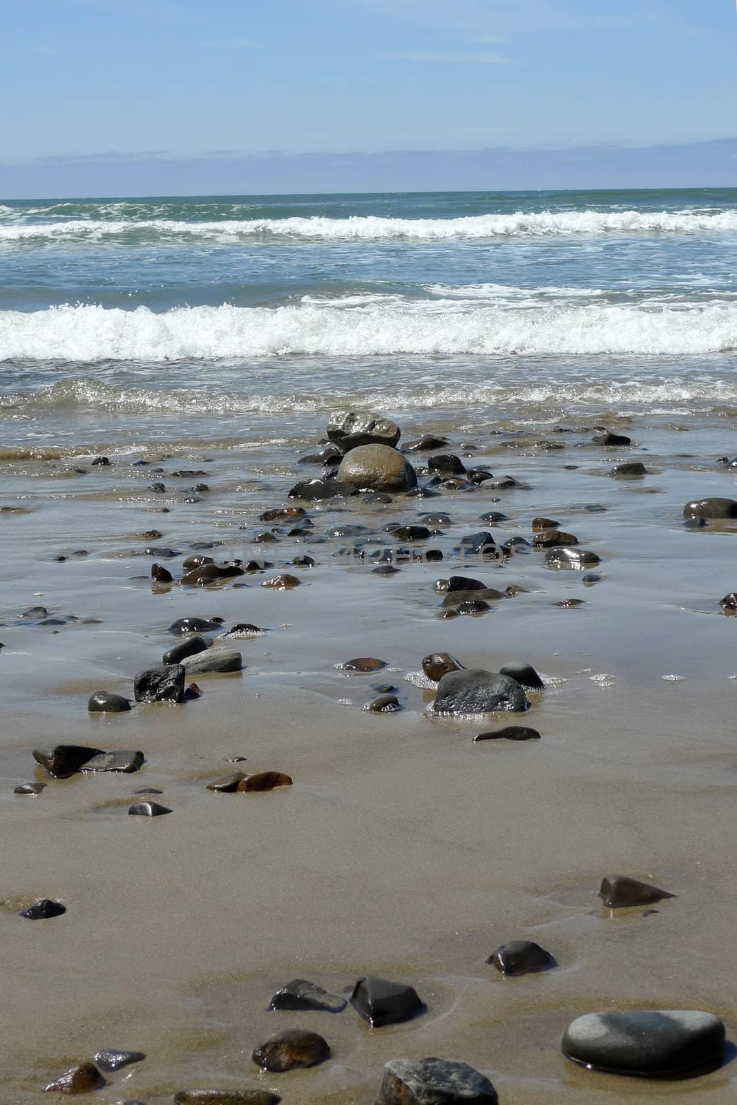 rocks on a beach by seattlephoto