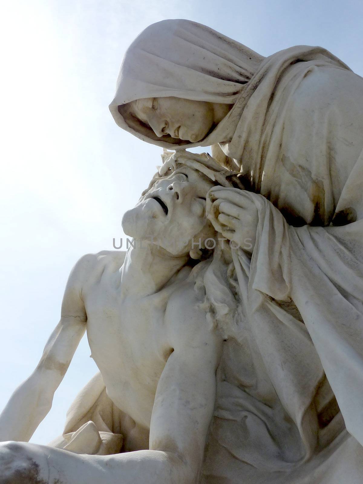 Statue made of white stone of Jesus and Mary at Marseilles mext to Notre-Dame de la Garde basilic